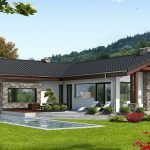 Villa moderna con giardino e piscina immersa nel verde, esempio di casa indipendente di design.