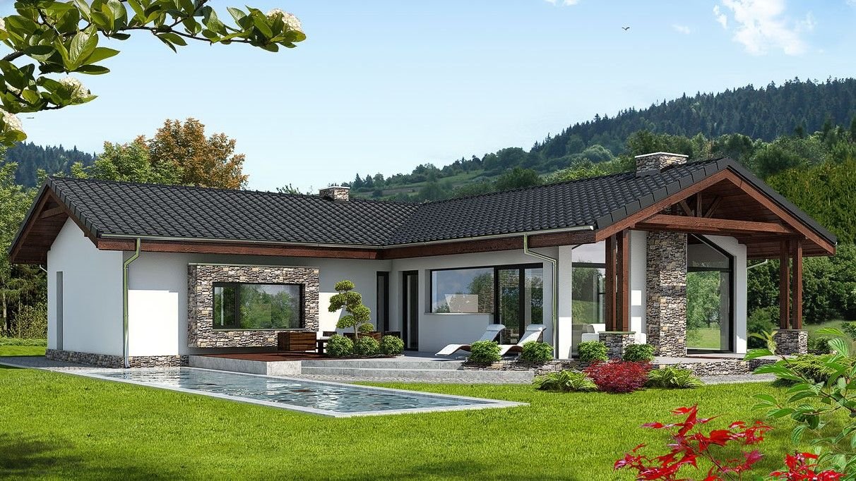 Villa moderna con giardino e piscina immersa nel verde, esempio di casa indipendente di design.